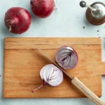 cutting-onions-on-a-wooden-board-jpg.webp.webp