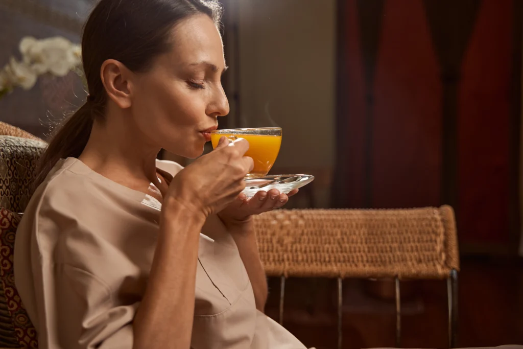 woman-drinking-vitamin-beverage-in-wellness-center-2025-03-05-04-43-11-utc-jpg.webp.webp