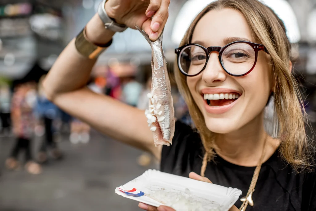 woman-with-dutch-herring-2025-03-13-07-10-48-utc-jpg.webp.webp