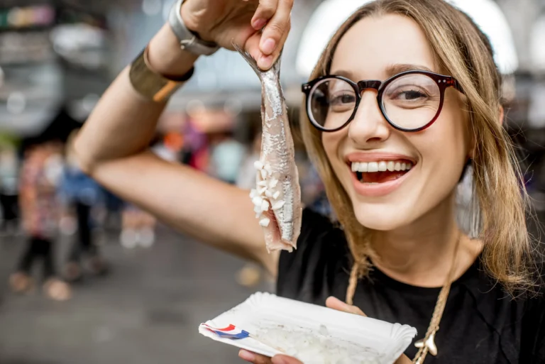 woman-with-dutch-herring-2025-03-13-07-10-48-utc-jpg.webp.webp