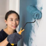 young-asian-happy-woman-painting-interior-wal-2025-03-07-16-41-03-utc-jpg.webp.webp