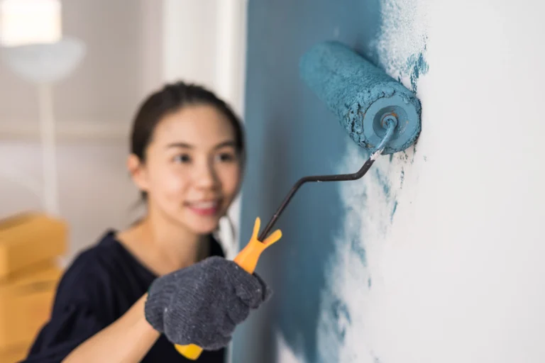 young-asian-happy-woman-painting-interior-wal-2025-03-07-16-41-03-utc-jpg.webp.webp