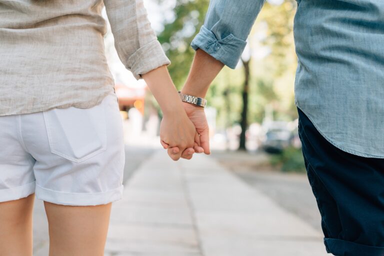 stock-holding-hands-couple.jpg